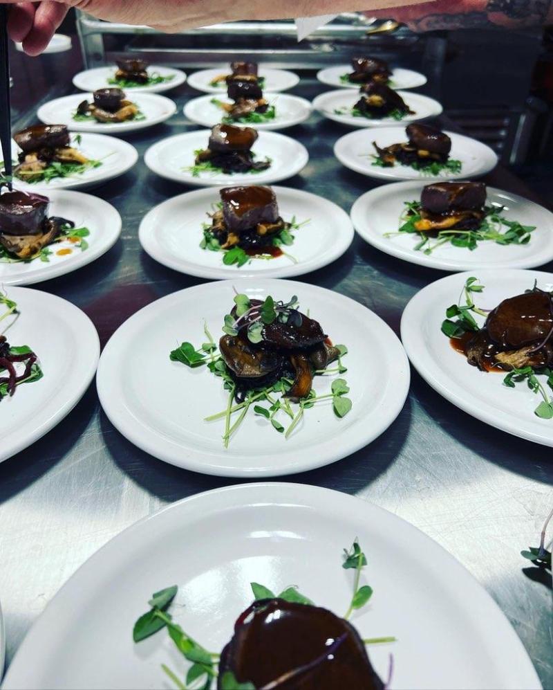 A row of plated courses ready for service